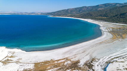 The tranquil beauty of Salda Lake - Turkey with its crystal clear turquoise waters and stunning...