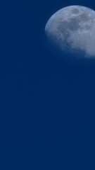 Moon with blue skies