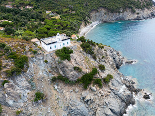 Aerial view of the Punta Polveria lighthouse on Elba Island Livorno