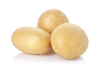Three fresh raw potatoes isolated on white
