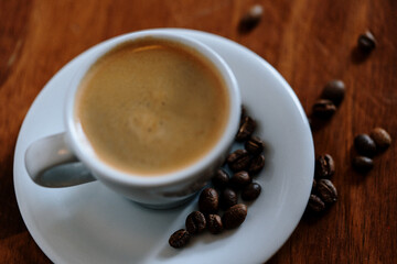 cup of coffee with beans