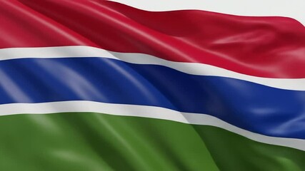 Gambia flag waving in the wind with vibrant colors in a patriotic display of national pride
