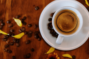 cup of coffee on wooden table