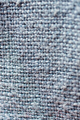 Close-up of grey woven linen fabric texture