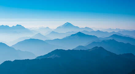 Fototapeta premium Stunning blue mountain range vista with hazy peaks perfect for travel adventure concepts