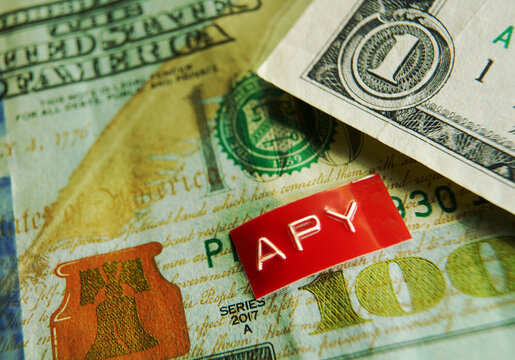APY - Annual Percentage Yield - label on a hundred dollar bill