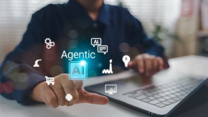 Hand touching Agentic AI interface with futuristic icons, representing autonomous artificial intelligence that makes decisions and takes action independently in smart digital systems and industries.