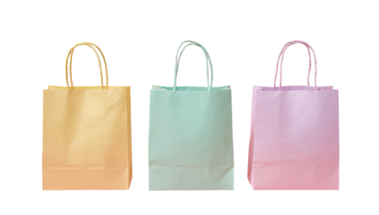 Three pastel-colored paper shopping bags