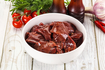 Raw chicken liver uncooked in the bowl