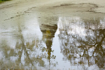 The reflection of a pagoda in the lotus pond.