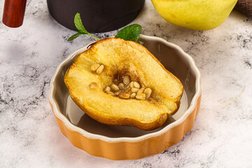 Baked quince with honey and cedar