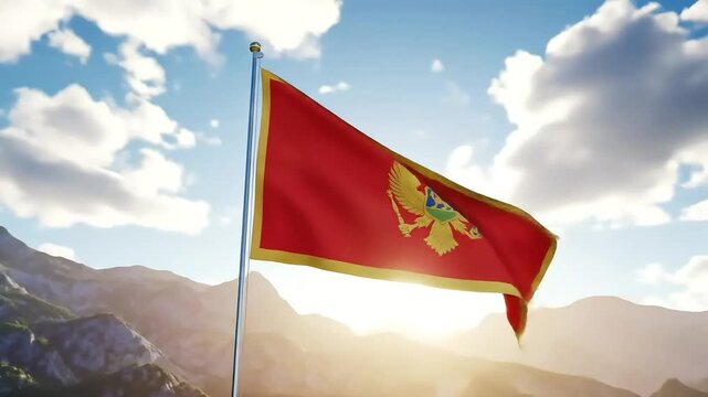 Montenegro flag waving proudly against sunny blue sky, a patriotic symbol of national pride