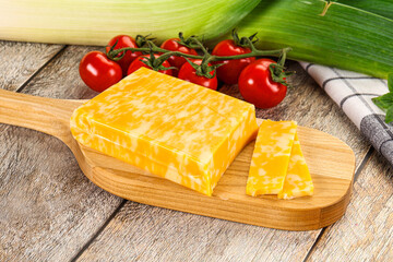 Marble yellow cheese with slices