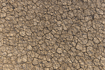 Cracked Earth Background Photo,Top view photos of arid soil surface.
