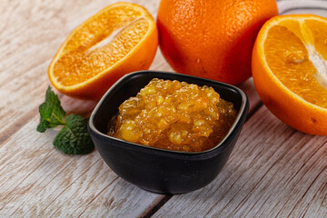 Sweet orange jam in the bowl