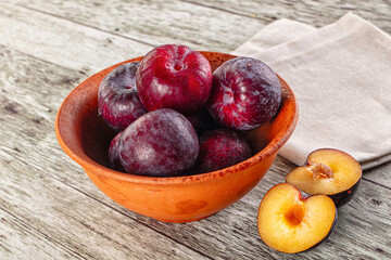 Ripe sweet juicy plum heap