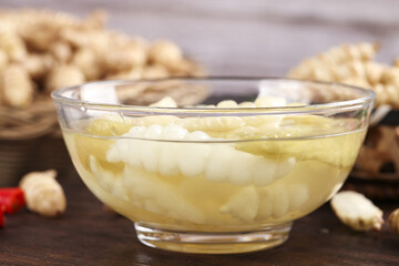 Freshly dug pickled pepper ground ring pagoda plate showcasing vibrant pickled vegetables and fresh herbs in a rustic setting