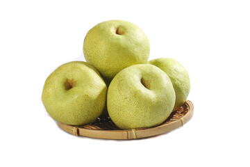 Fresh Tongchuan Crisp Pears displayed in a traditional basket on a bright background during midday