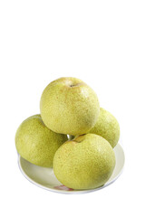 Elegant display of fresh tribute pears arranged on a plate against a clean white background for a vibrant, refreshing look