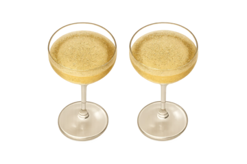 Top view of two champagne glass pair filled with sparkling wine on transparent background