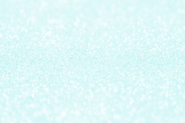Obraz premium Blue pastel glitter snowfall snowflake texture background. The concept of New Year, Christmas and all celebration background concepts.