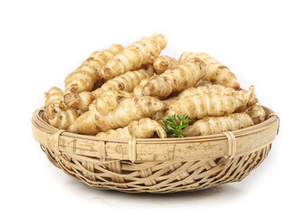 Groundsel and Ganoderma dietary characteristics showcased in natural setting with basket and fresh specimens