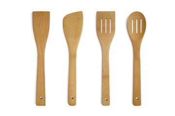 Wooden kitchen utensils on white background