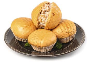 Enjoying walnut buns filled with runny popcorn Cantonese dim sum on a clean white background