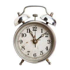 A vintage-style alarm clock with a slightly aged face