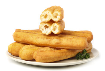 Crispy fried ghost snacks arranged on a plate with a white background showcasing their deliciousness