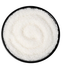 Granulated sugar bowl displaying pure white sugar for culinary uses and sweetening beverages in a kitchen setting