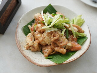 Stir-fried sea bass with celery, ready to serve hot.