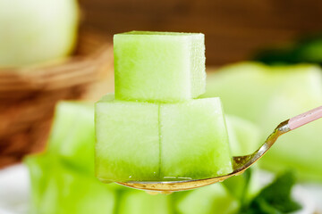 Freshly harvested jade mushroom melon cubes prepared for tasting in Shandong province