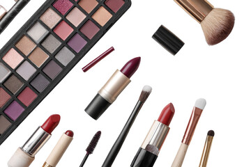 Assorted makeup products on black background.  Palette of eyeshadows, lipsticks, brushes, mascara.  Flat lay, top view