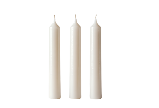 Three simple, white pillar candles, vertically aligned against a black background
