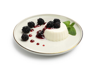Tasty panna cotta with blackberries, mint and sauce isolated on white