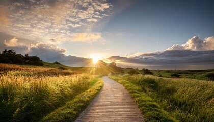 pathway illuminated by sunlight through clouds in a serene landscape during early morning hours
