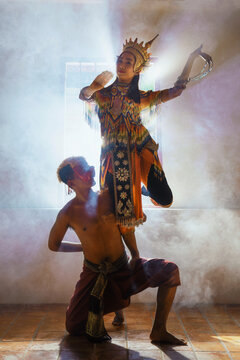 Two dancers performing a classical Thai masked Khon dance performance, Thailand
