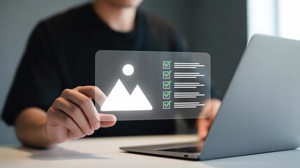 Person interacting with a futuristic transparent screen displaying a checklist and a mountain image, symbolizing digital organization and planning.