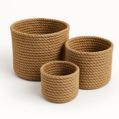 Three natural woven jute baskets of varying sizes arranged on a white background