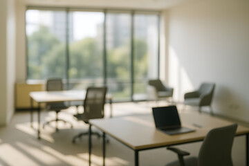 Modern office space with desks chairs and laptop for coworking concept