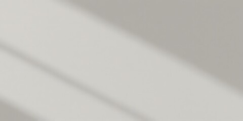 Brushed metallic gray steel surface with a subtle reflection and vertical lines, a stainless texture pattern for a modern backdrop