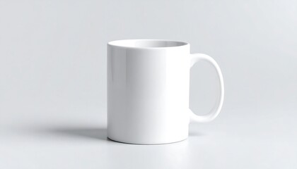 Obraz premium White ceramic coffee mug on a clean white background for customization, Blank mug with a handle on a seamless bright surface ready for your design