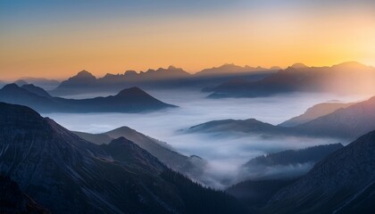 Obraz premium a misty mountain range at dawn with the sun peeking through the clouds