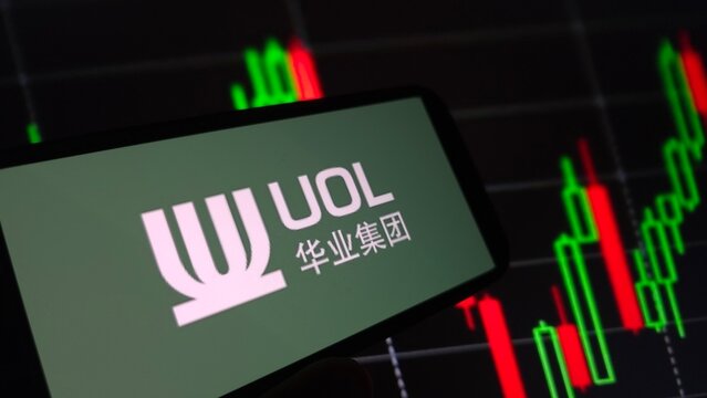 Konskie, Poland - July 31, 2025: UOL Group company logo displayed on mobile phone