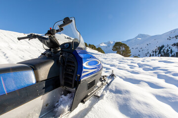 Snowmobile adventure in a winter mountain landscape