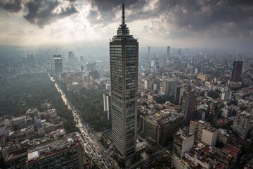 Fototapeta premium Mexico City skyscraper aerial view, urban sprawl, hazy day, travel