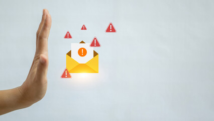 Email security and spam alert with hand blocking warning messages