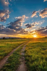 Fototapeta premium Rural dirt road at sunset