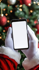 Close-up of smartphone with blank screen (mock up) in hands of Santa Claus in white gloves. Vertical image.